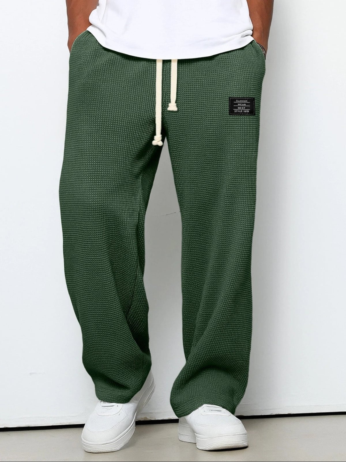 pantalon homme coupe droite large taille élastique en vert foncé