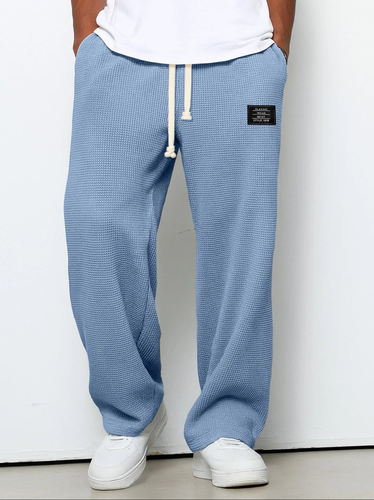 pantalon homme coupe droite large taille élastique en bleu ciel