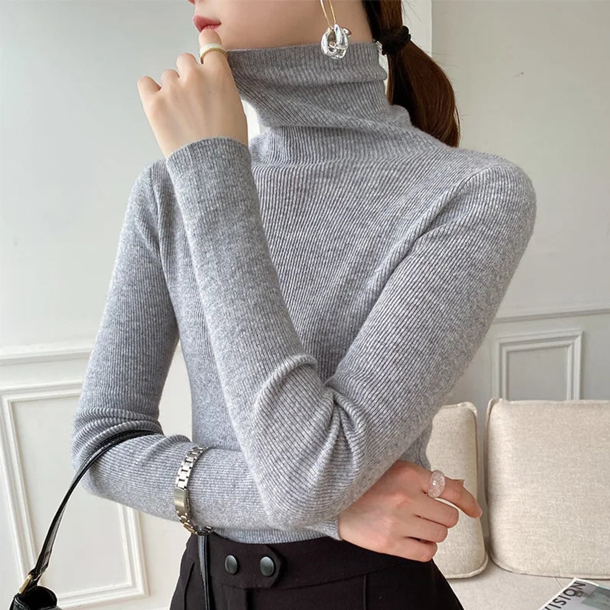 pull femme col roulé coupe slim en gris