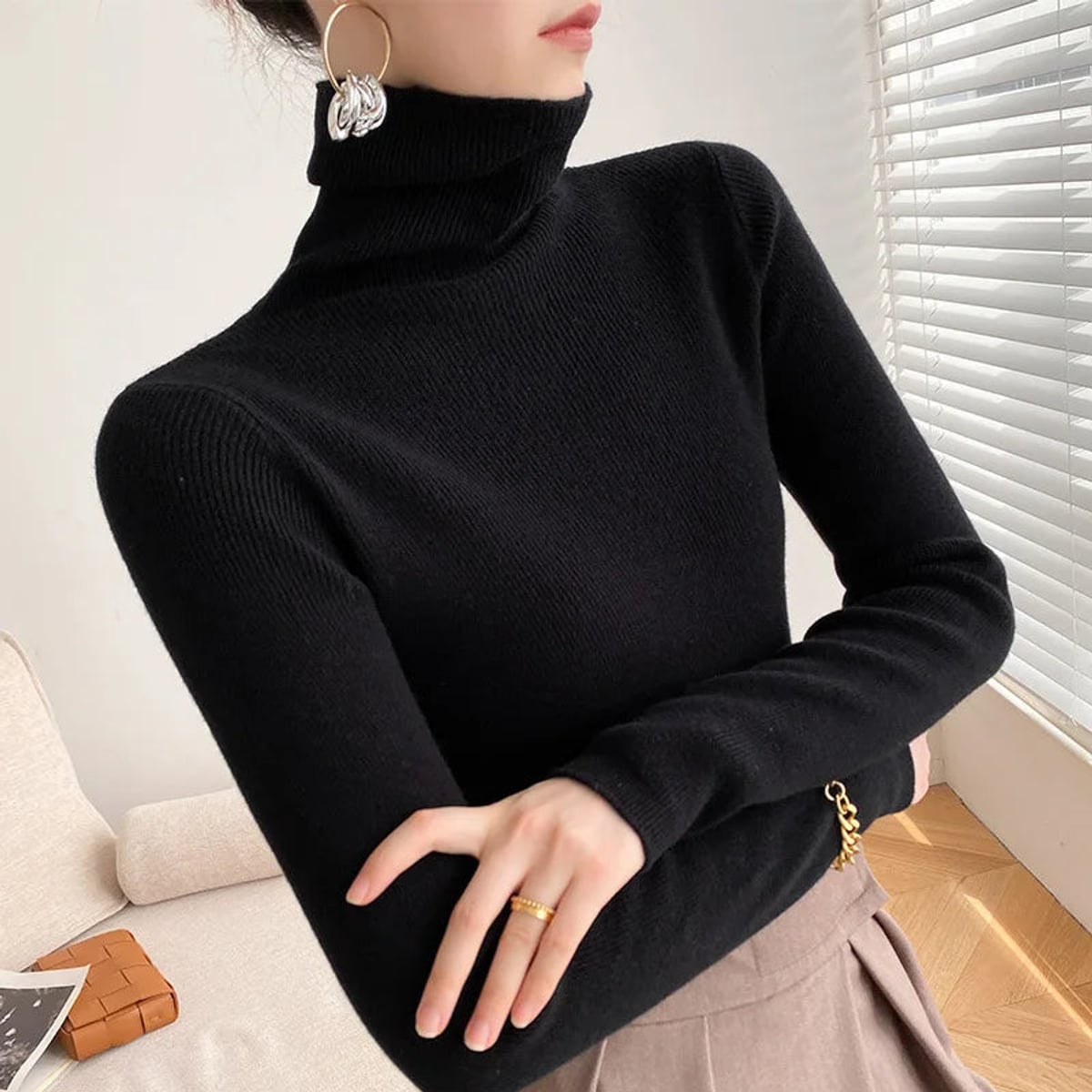 pull femme col roulé coupe slim en noir