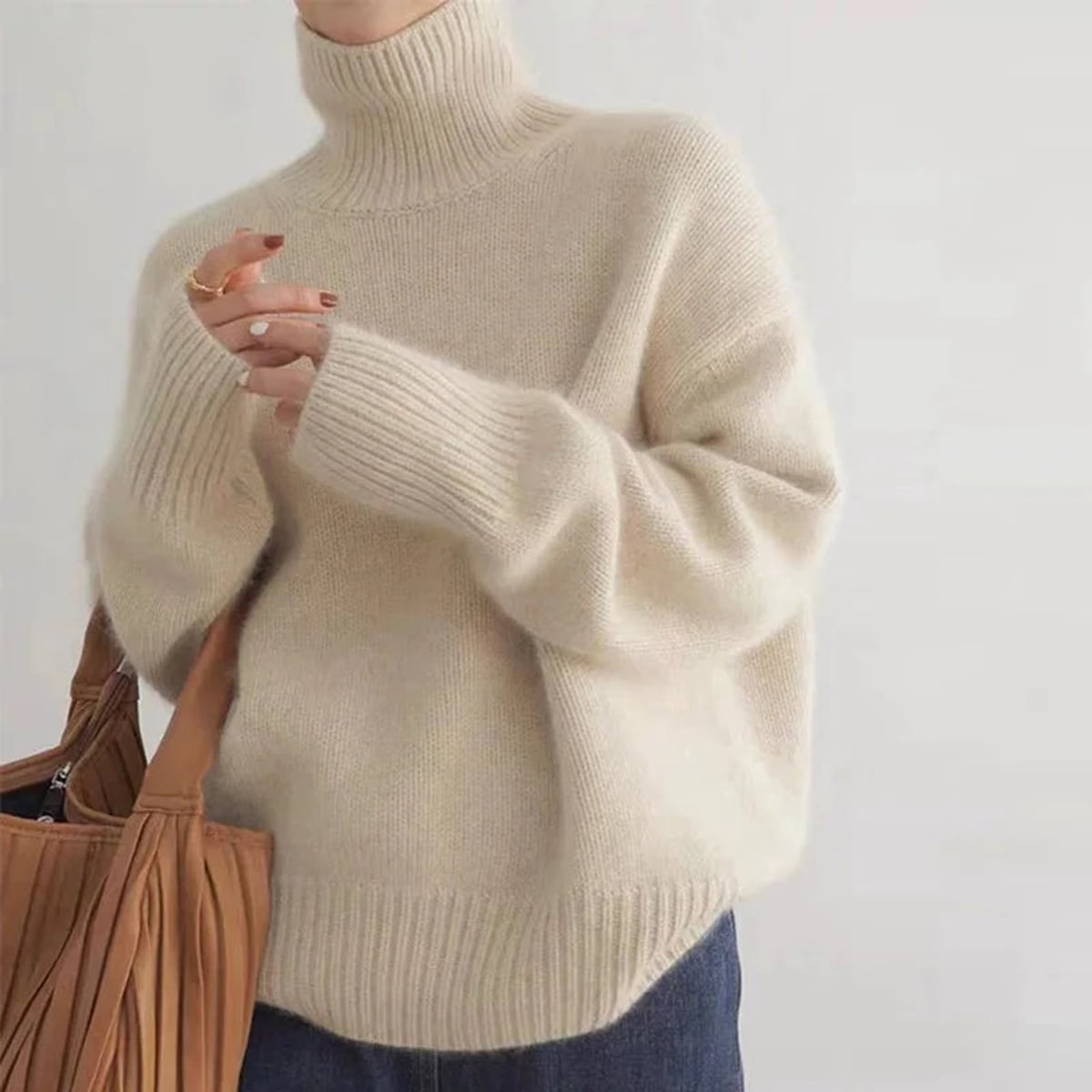 pull femme col roulé oversize en abricot