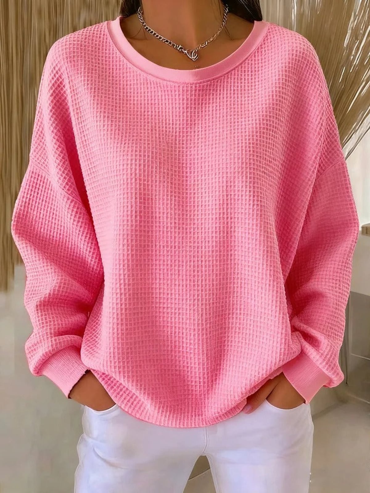 pull femme oversize col rond texturé en rose