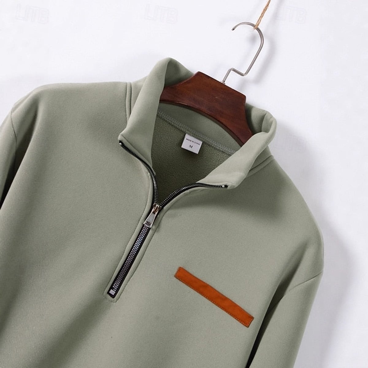 pull homme col zippé coupe relax matière douce