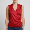 Blouse cache-cœur sans manches femme