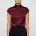 Blouse col montant plissé femme
