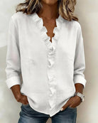blouse femme col en v à volants manches longues en blanc