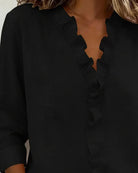 blouse femme col en v à volants manches longues en noir