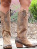 bottes cowboy femme à rivets montantes en jaune