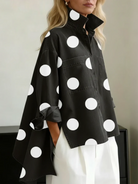 chemisier femme oversize à pois col montant en noir