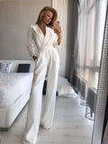 combinaison femme manches longues col en v large en blanc