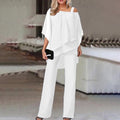 combinaison pantalon femme col asymétrique voilé en blanc