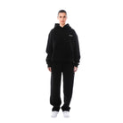 ensemble jogging femme oversize à capuche en noir
