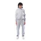 ensemble jogging femme oversize à capuche en gris clair