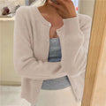 gilet femme col rond coupe ample boutonné en beige