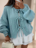 gilet femme oversize nœud avant en bleu