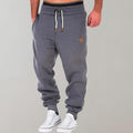 jogging homme coupe droite taille élastiquée en gris foncé