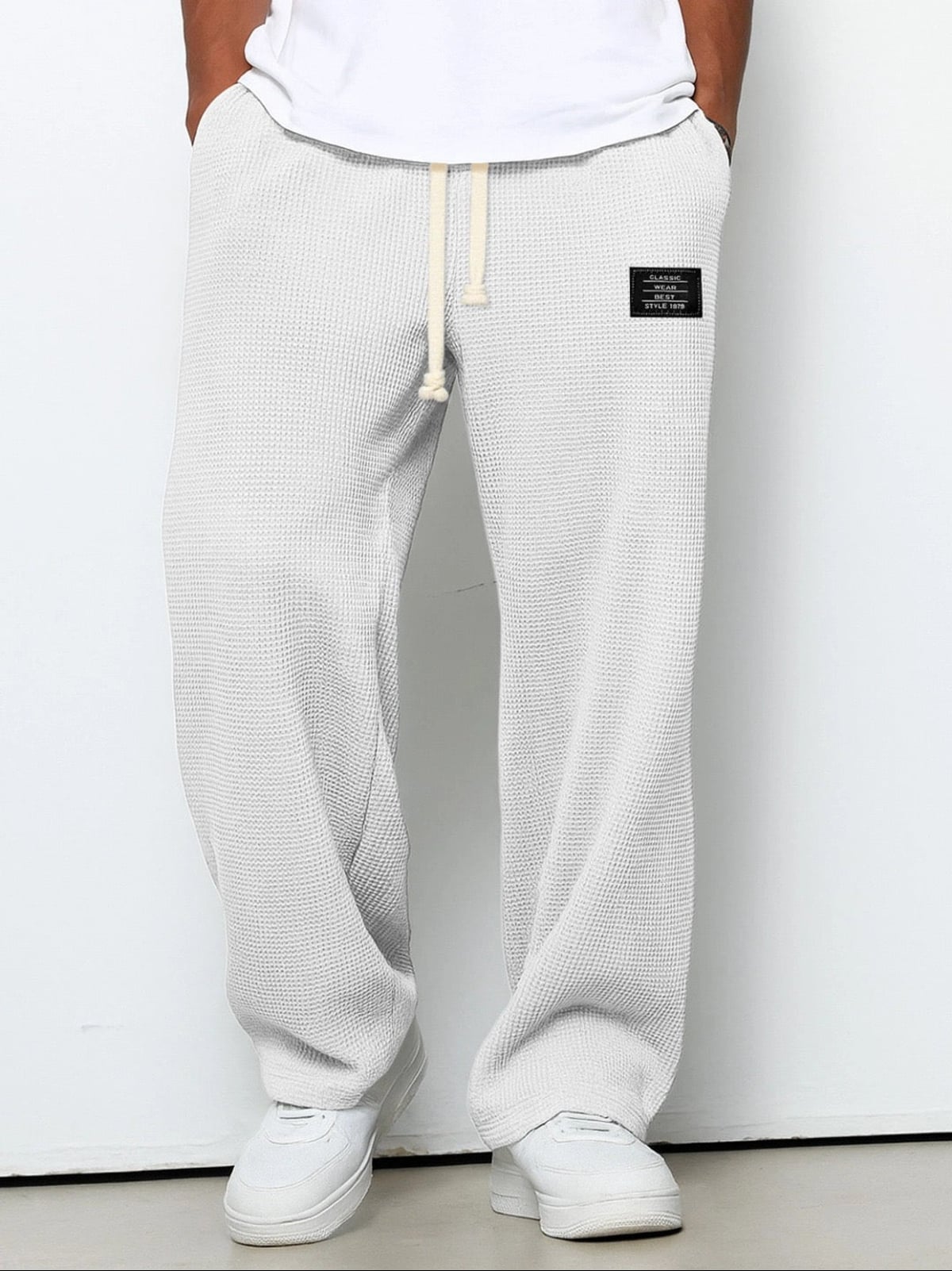 pantalon homme coupe droite large taille élastique en blanc