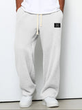 pantalon homme coupe droite large taille élastique en blanc