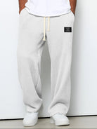 pantalon homme coupe droite large taille élastique en blanc