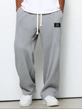 pantalon homme coupe droite large taille élastique en gris