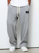 pantalon homme coupe droite large taille élastique en gris