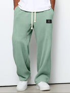 pantalon homme coupe droite large taille élastique en vert