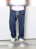 pantalon homme coupe droite large taille élastique en bleu
