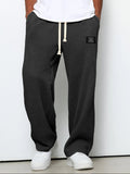 pantalon homme coupe droite large taille élastique en noir