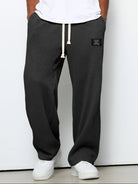 pantalon homme coupe droite large taille élastique en noir