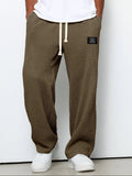 pantalon homme coupe droite large taille élastique en brun foncé