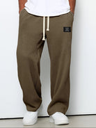 pantalon homme coupe droite large taille élastique en brun foncé