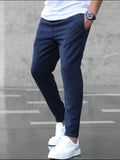 pantalon homme coupe droite taille mi-haute en bleu marine