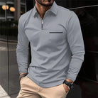 polo homme col zippé coupe régulière en gris