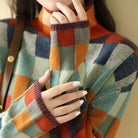 pull femme col montant motif carreaux