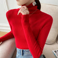 pull femme col roulé coupe slim en rouge
