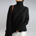 pull femme col roulé jacquard losanges oversize en noir