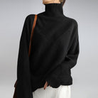 pull femme col roulé jacquard losanges oversize en noir
