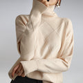 pull femme col roulé jacquard losanges oversize en beige
