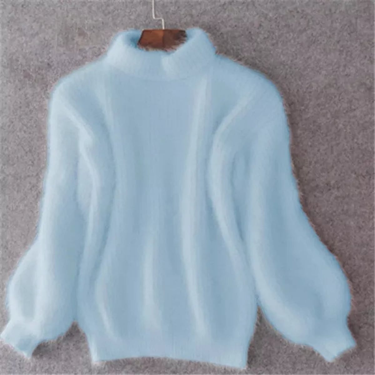 pull femme col roulé manches bouffantes en bleu