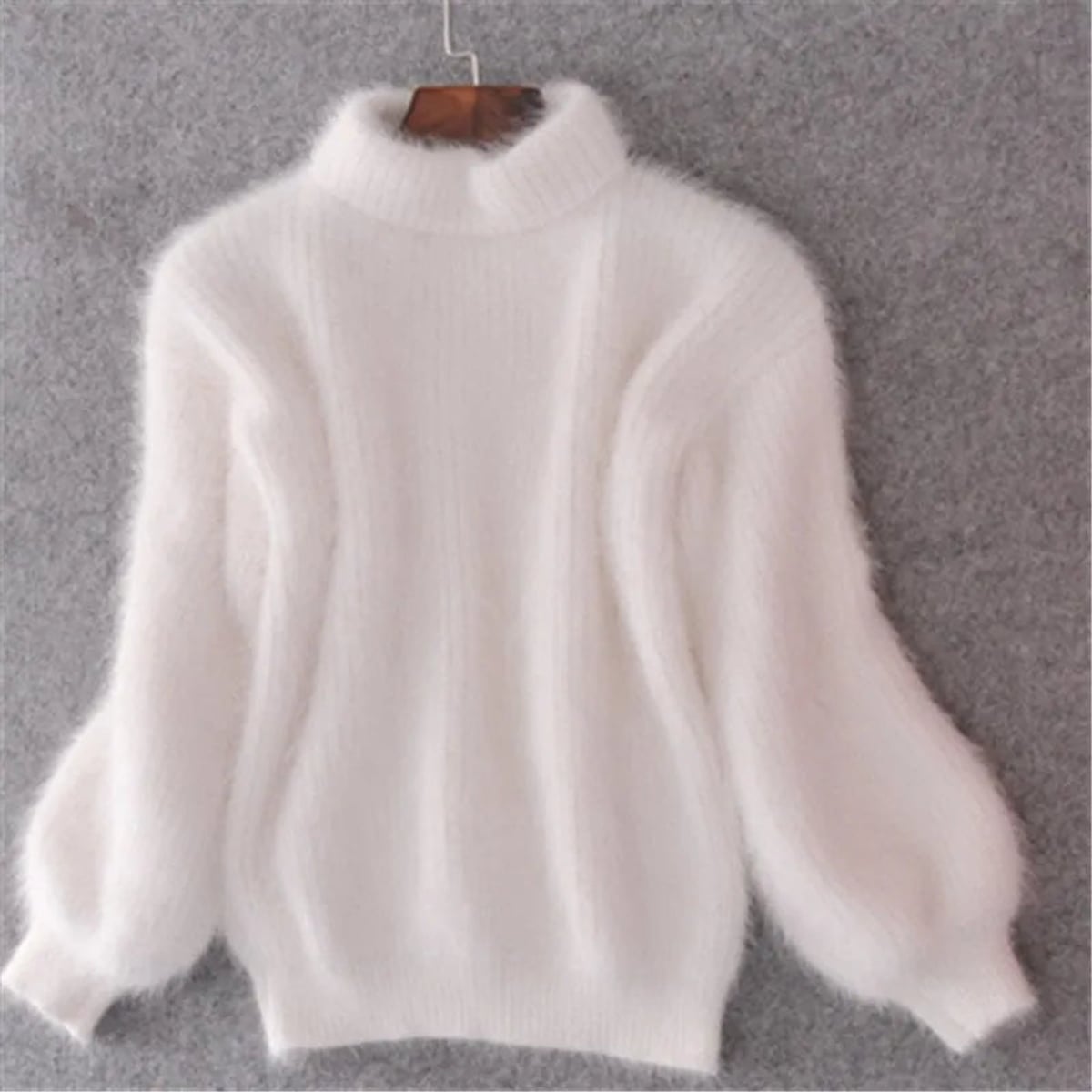 pull femme col roulé manches bouffantes en blanc