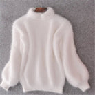 pull femme col roulé manches bouffantes en blanc