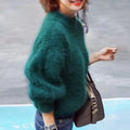 pull femme col roulé manches bouffantes en vert