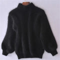 pull femme col roulé manches bouffantes en noir