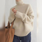 pull femme col roulé oversize en abricot
