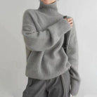 pull femme col roulé oversize en gris