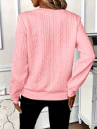 pull femme col zippé torsadé manches longues en rose