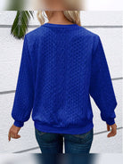 pull femme col zippé torsadé manches longues en bleu