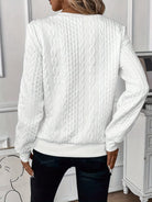 pull femme col zippé torsadé manches longues en blanc