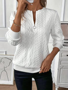 pull femme col zippé torsadé manches longues en blanc