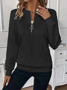 pull femme col zippé torsadé manches longues en noir